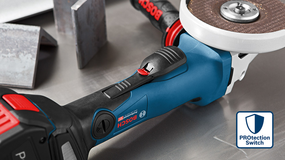 PROtection Switch A blue Bosch Professional angle grinder on a metal surface with metal pieces nearby.