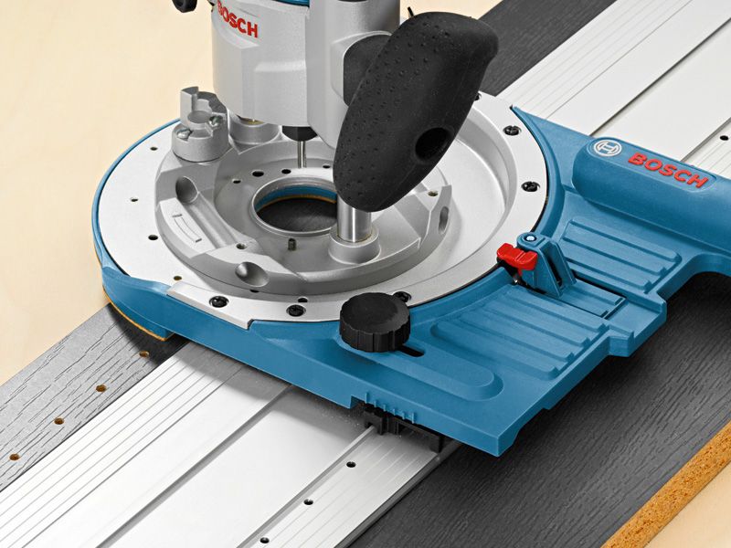 Router guide rail system accessory attached for precise straight edge routing.