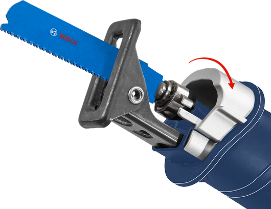 Reciprocating saw blade being inserted into a power tool with a locking mechanism.