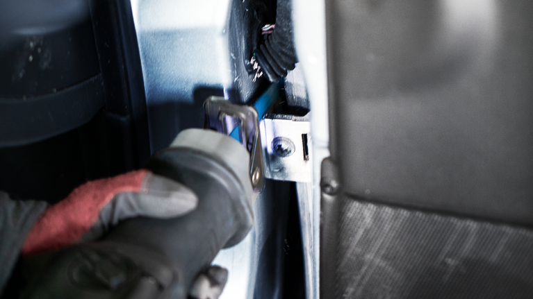 EXPERT ‘Vehicle Rescue’ S 1157 CHM Reciprocating Saw Blade 1-pc Person wearing safety equipment uses a reciprocating saw to cut metal inside a vehicle.
