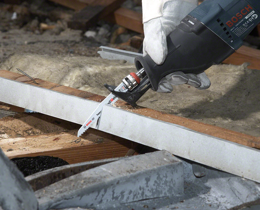Reciprocating saw blade S 1111 DF Person wearing safety equipment cuts a wooden beam using a reciprocating saw.