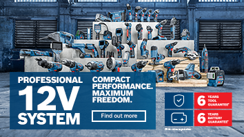 Bosch Professional 12V tools displayed on wooden platform in a workshop setting.