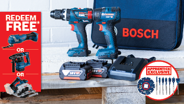 A blue Bosch Professional cordless drill and driver set is displayed on a wooden surface, with two batteries and a charger. A black Bosch bag is in the background, alongside a promotional graphic for free tools and accessories. The setting is bright and organized, suggesting a professional workspace.