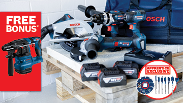 A variety of Bosch Professional tools, including a drill, jigsaw, and batteries, displayed on a wooden surface with a promotional banner.